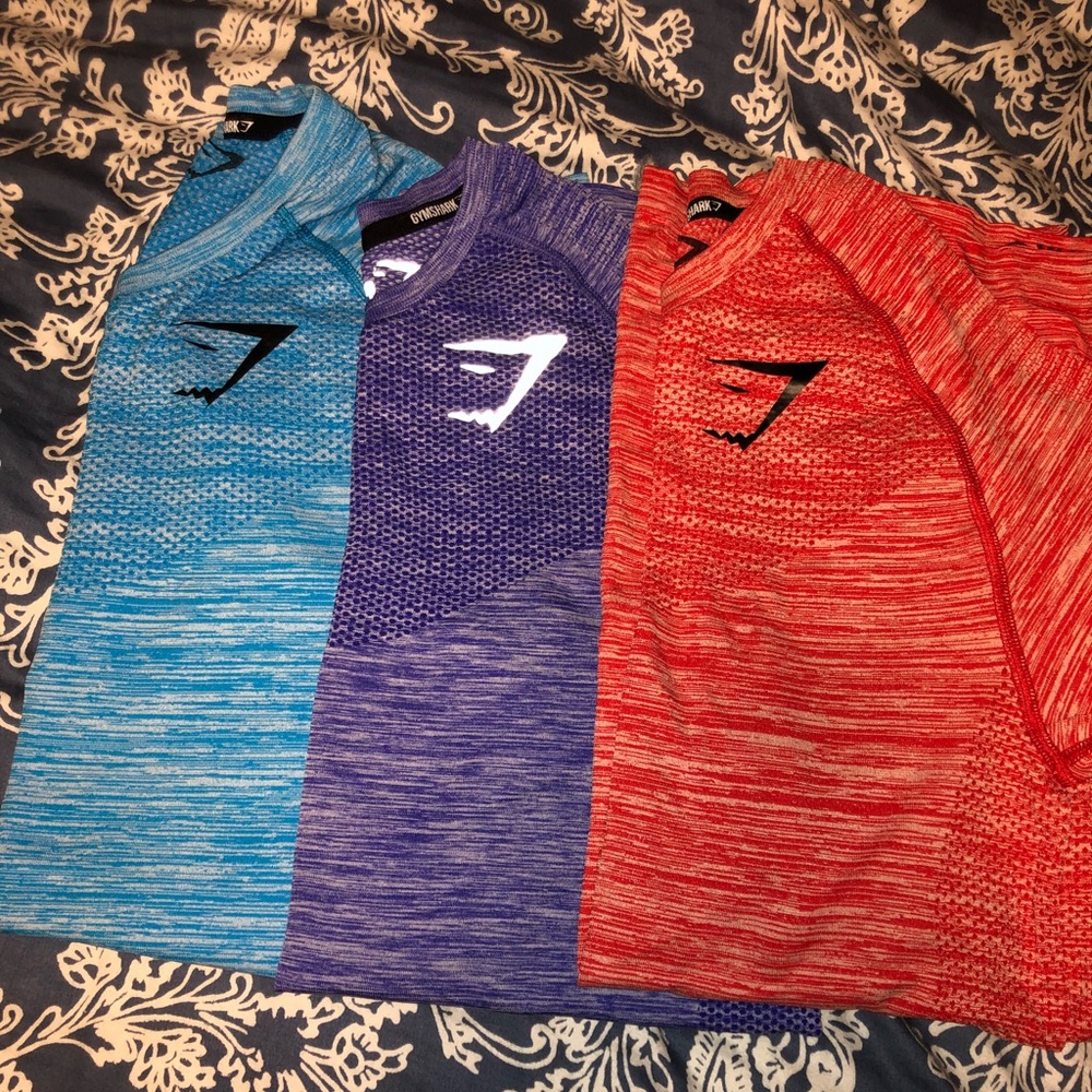 Size medium men’s gym shark shirts